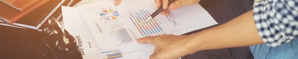 Close-up shot of an analytical team working with the latest financial results, Office life concept.